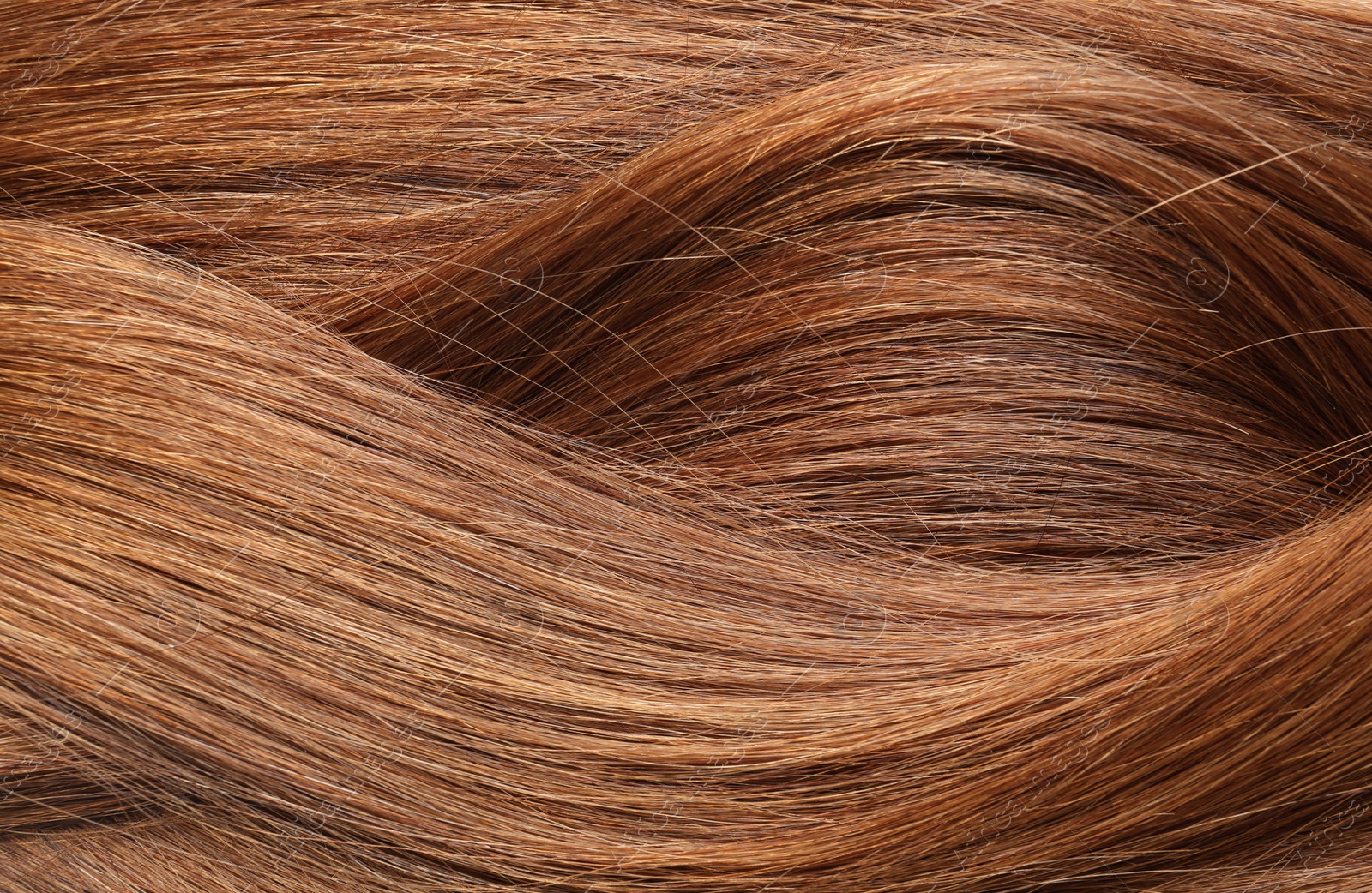 Photo of Texture of healthy red hair as background, closeup