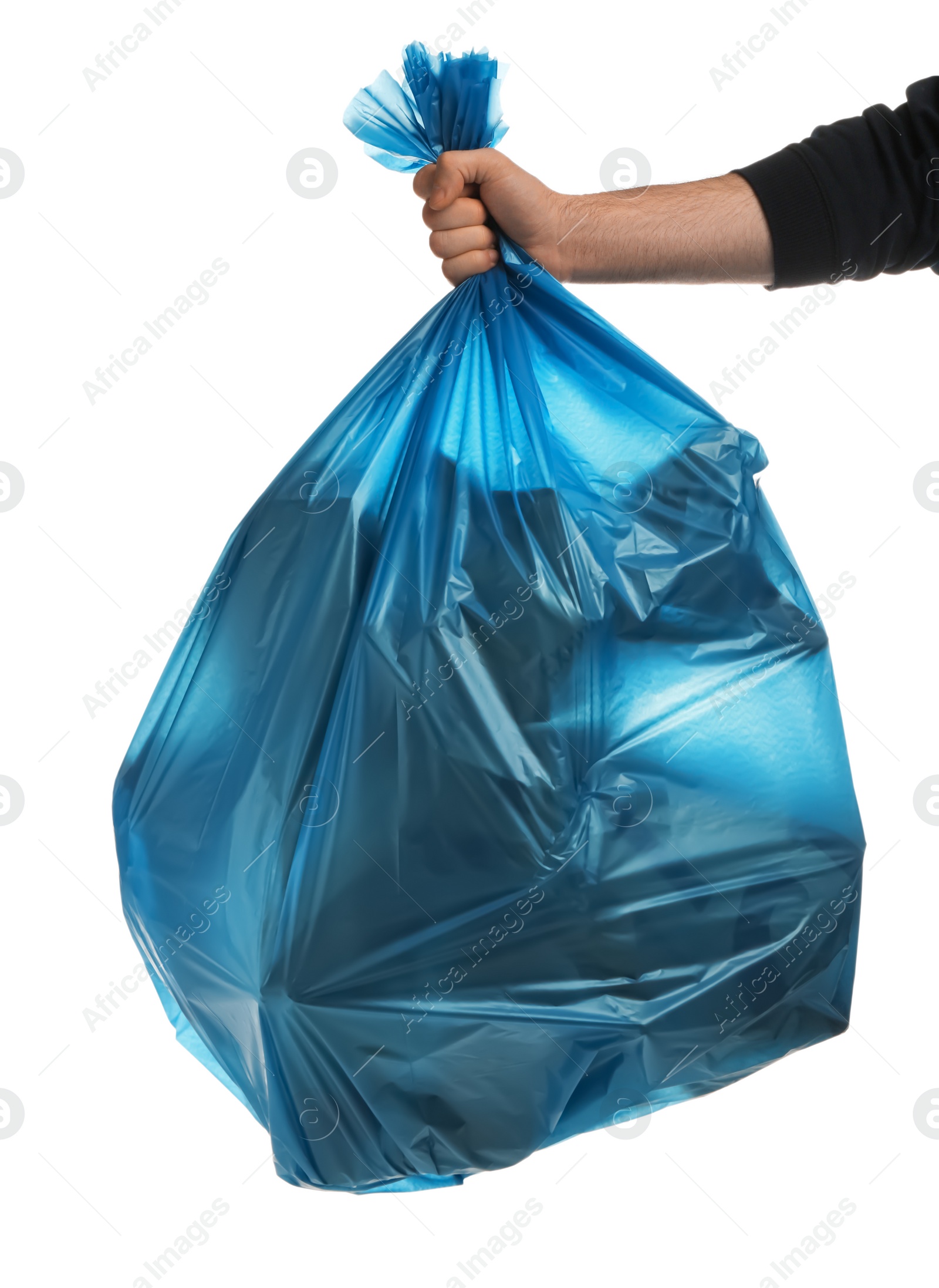 Photo of Man holding trash bag filled with garbage on white background, closeup