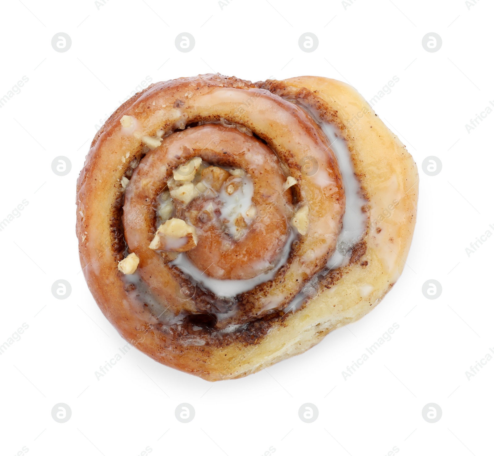 Photo of One tasty cinnamon roll with nuts isolated on white, top view
