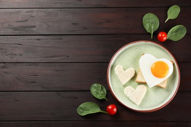 Photo of Flat lay composition of tasty breakfast with heart shaped fried egg. Space for text