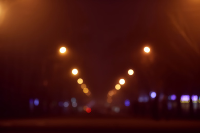 Photo of Blurred view of night city. Bokeh effect