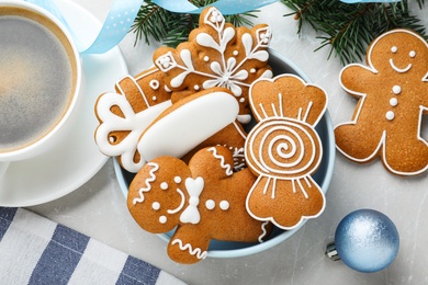 Photo of Delicious Christmas cookies on light table, flat lay