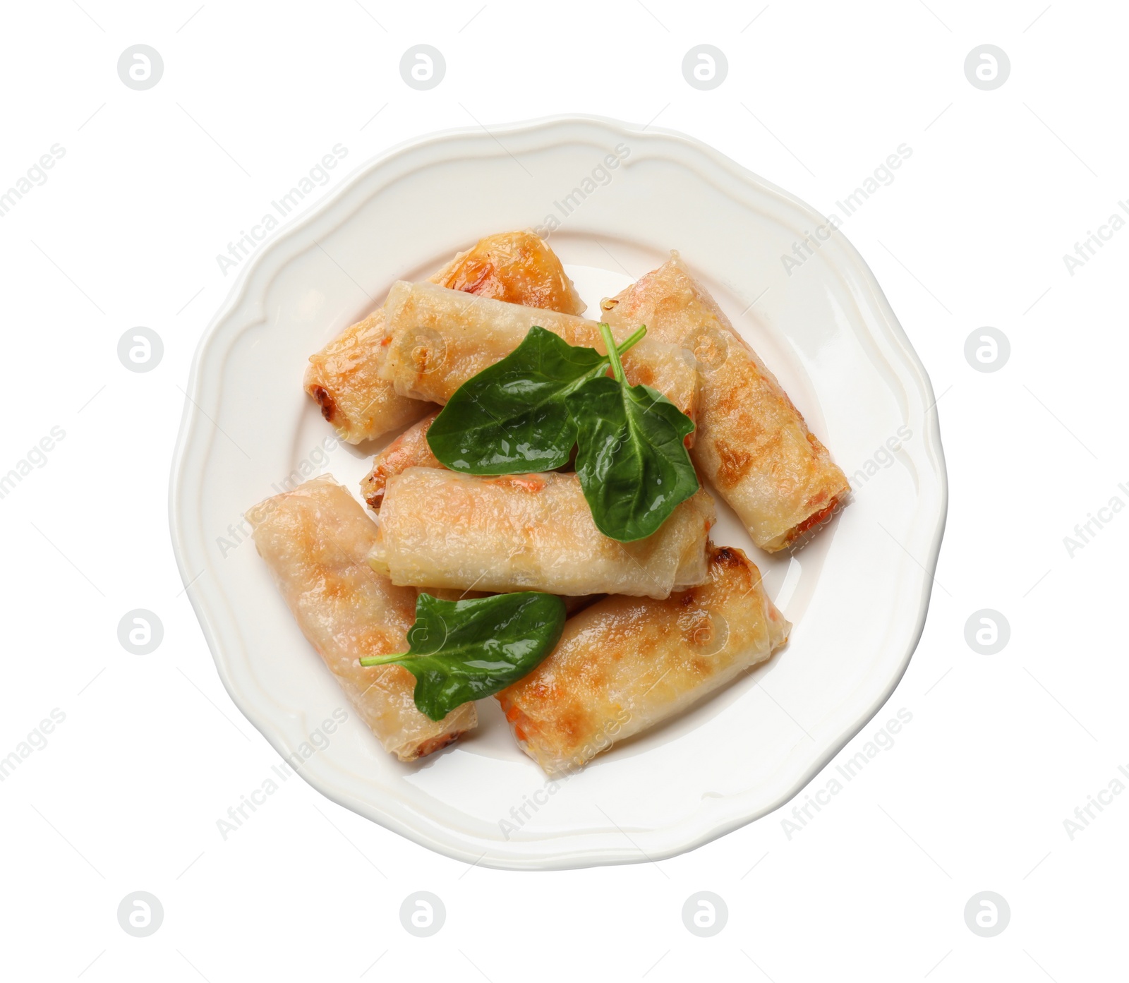 Photo of Tasty fried spring rolls and spinach isolated on white, top view