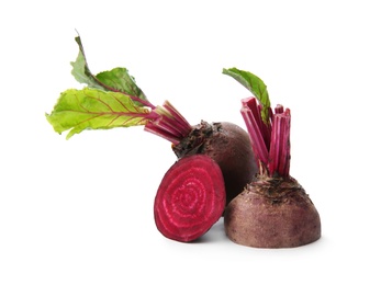 Photo of Cut fresh red beets on white background