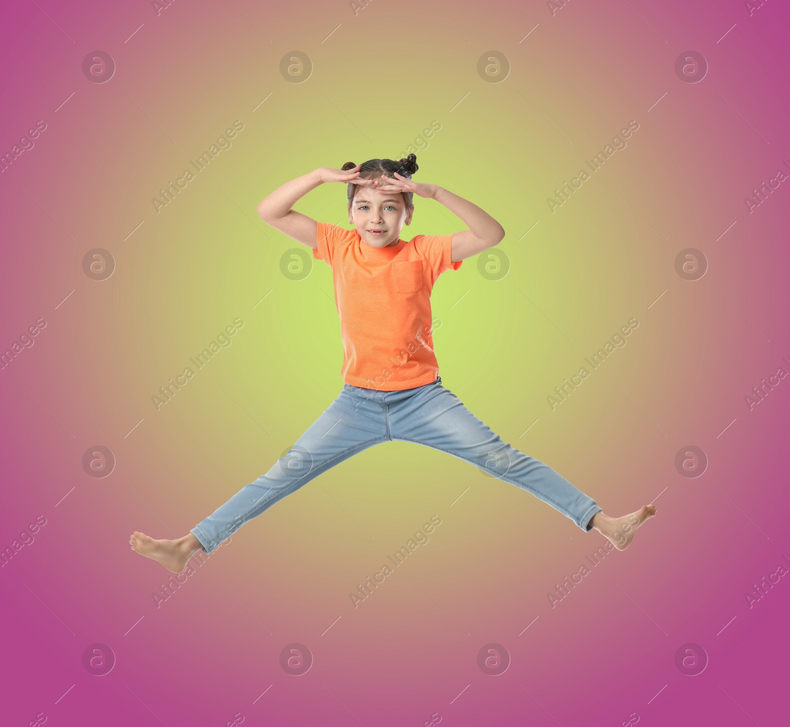 Image of Happy cute girl jumping on color gradient background