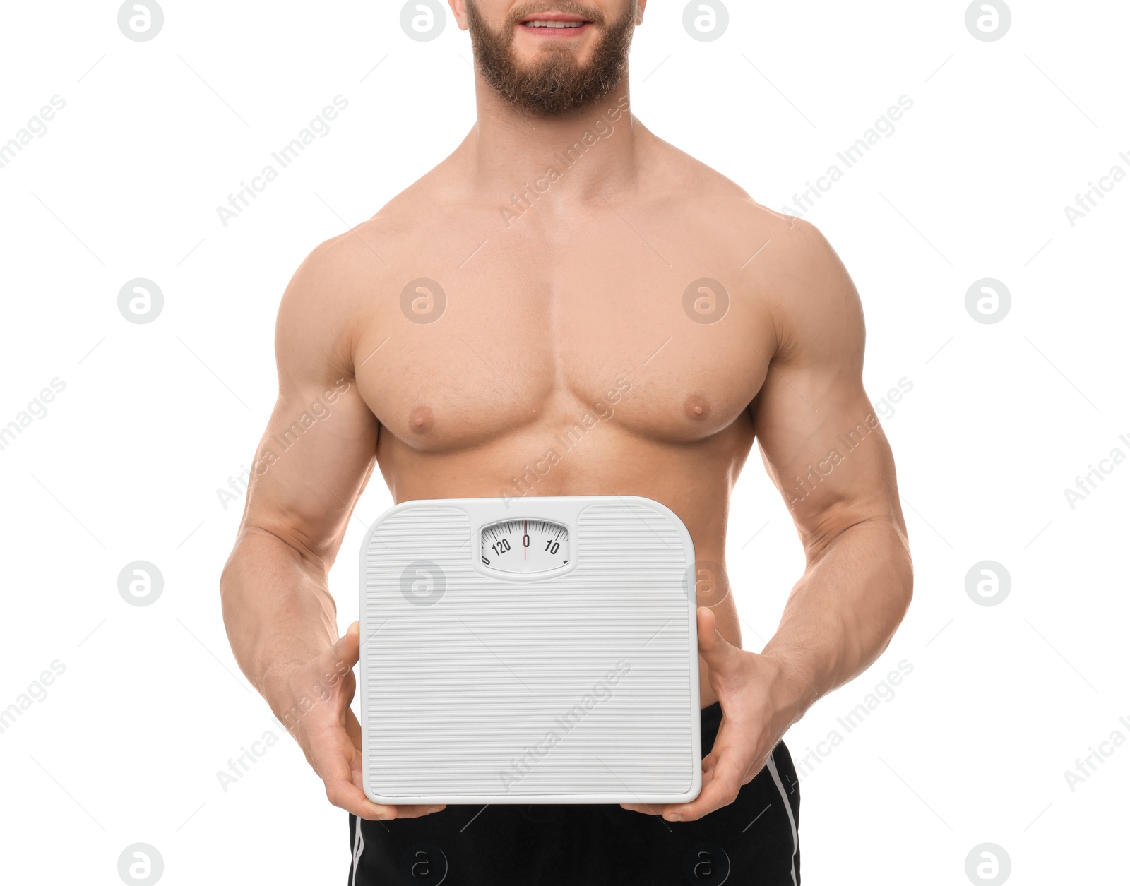 Photo of Athletic man holding scales on white background, closeup. Weight loss concept