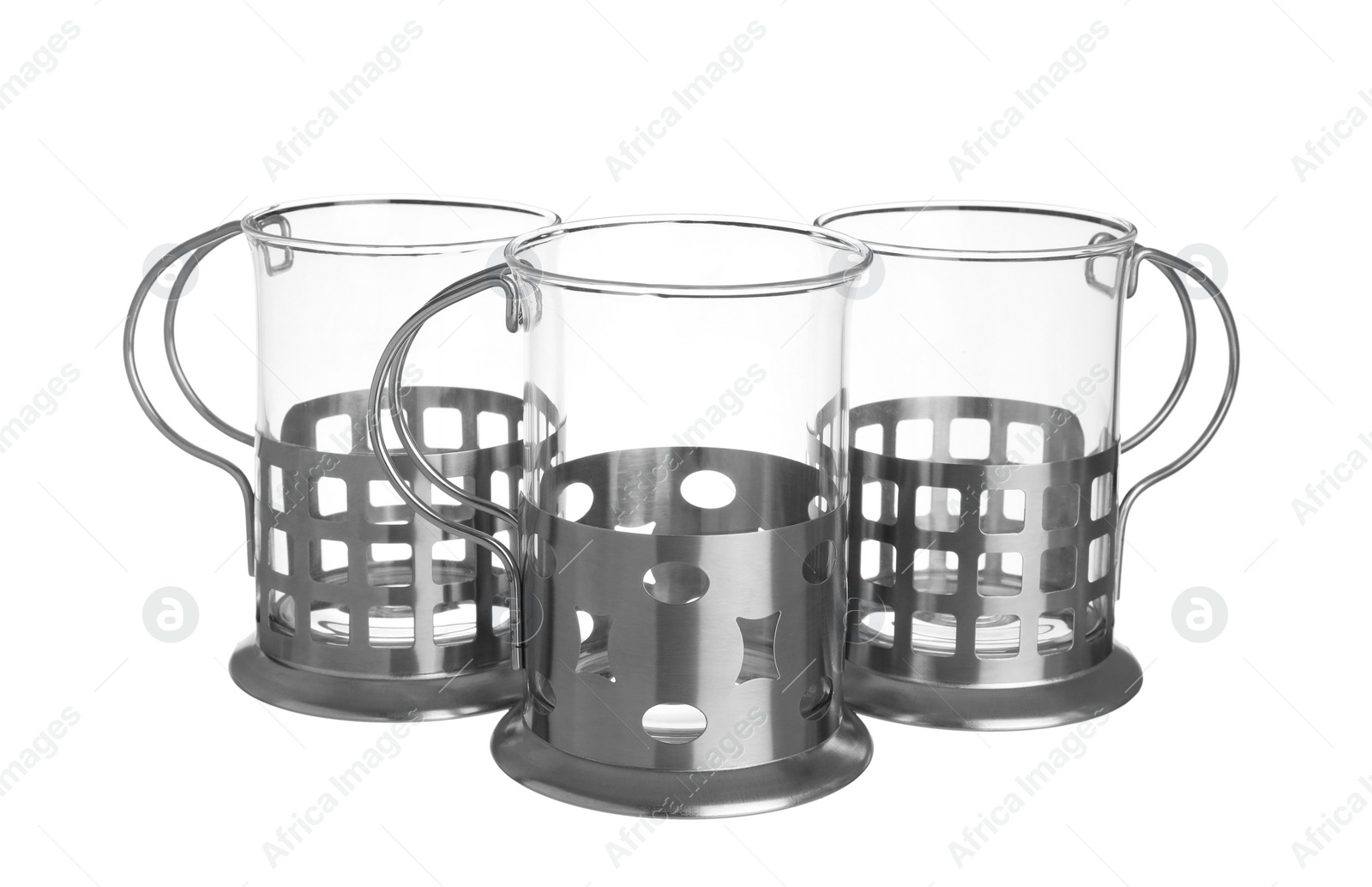 Photo of Traditional tea glass holders on white background