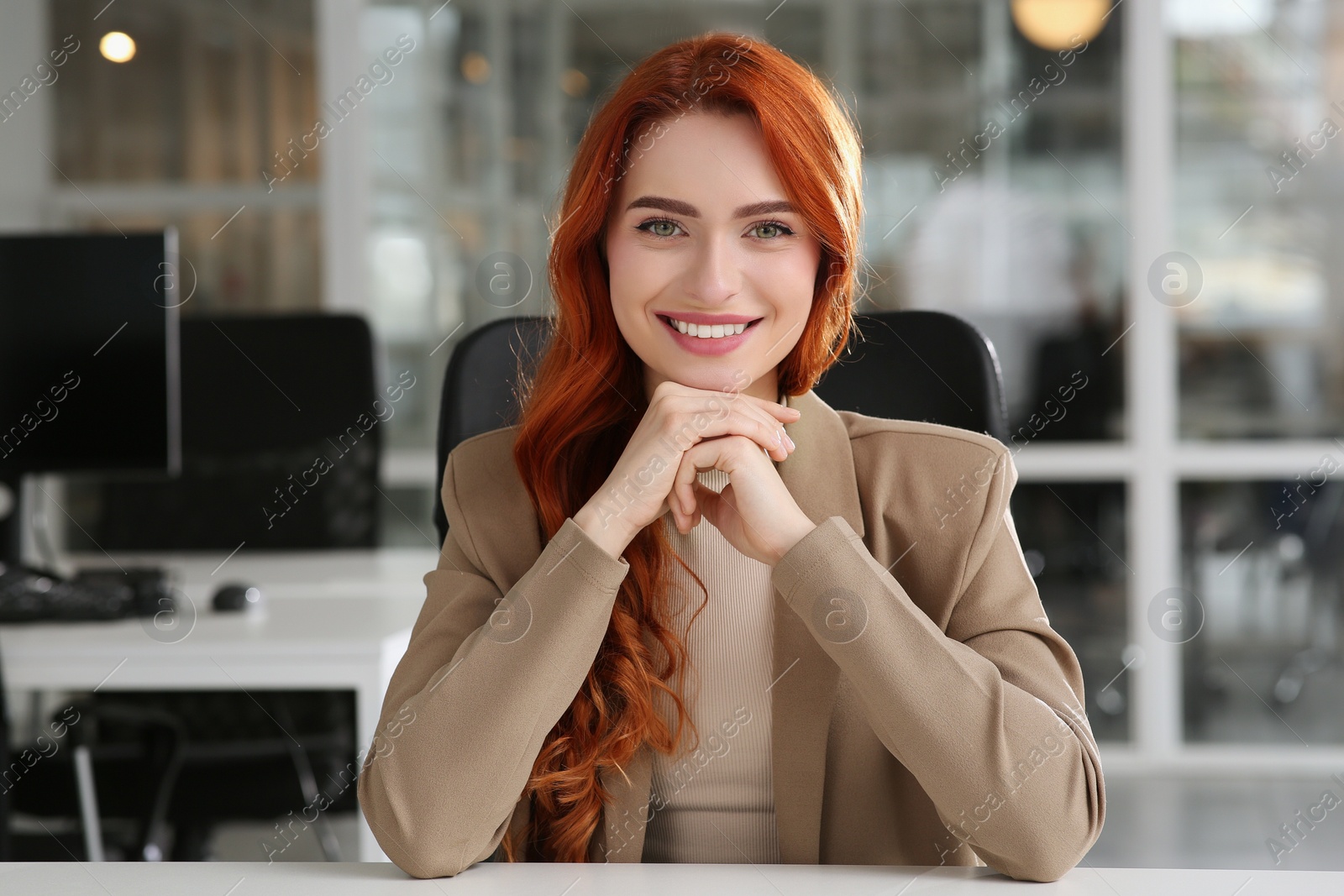 Photo of Happy woman having video call at white desk in office, view from web camera