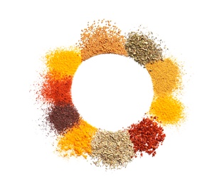 Frame made of different aromatic spices on white background, top view with space for text