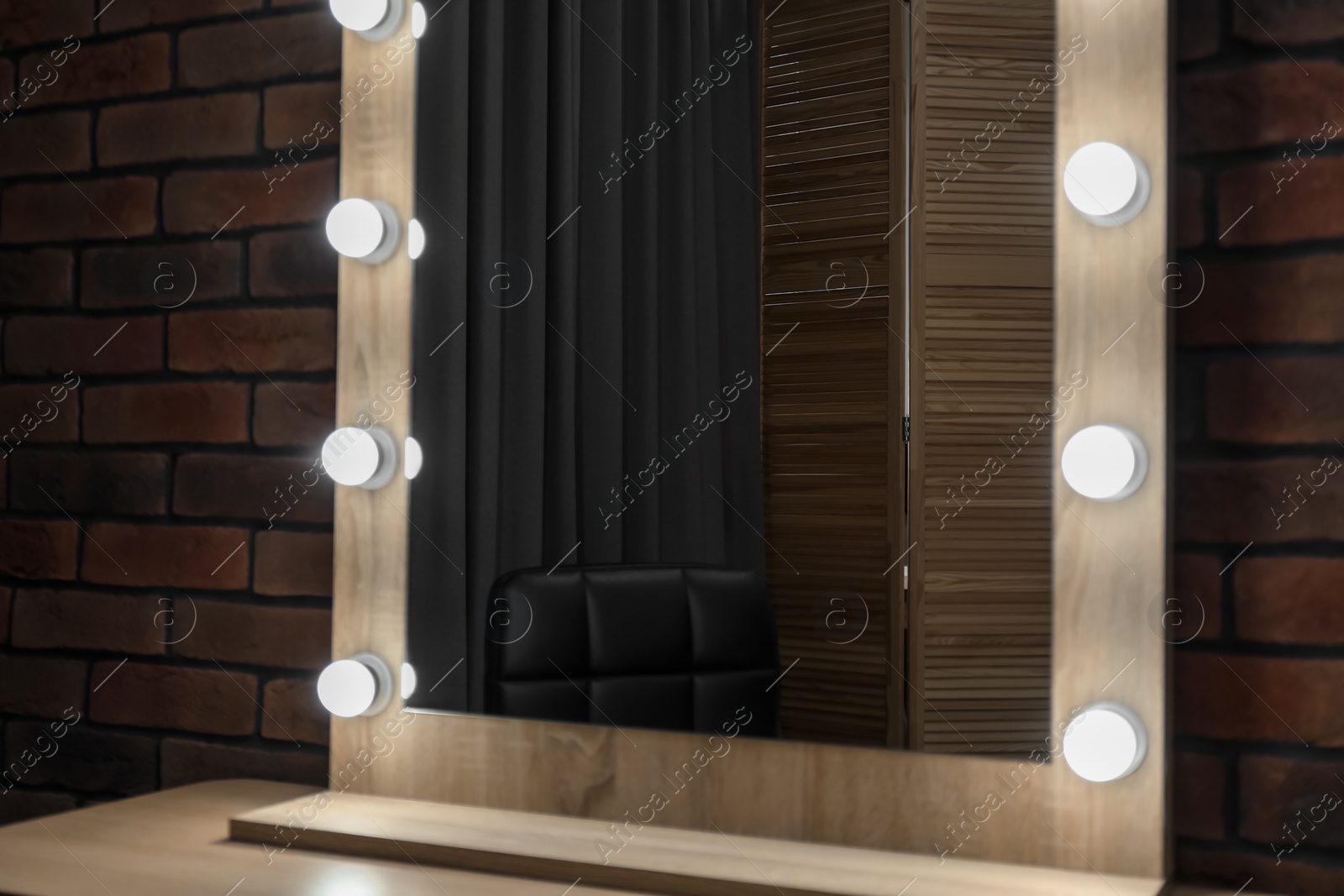 Photo of Mirror with light bulbs in makeup room