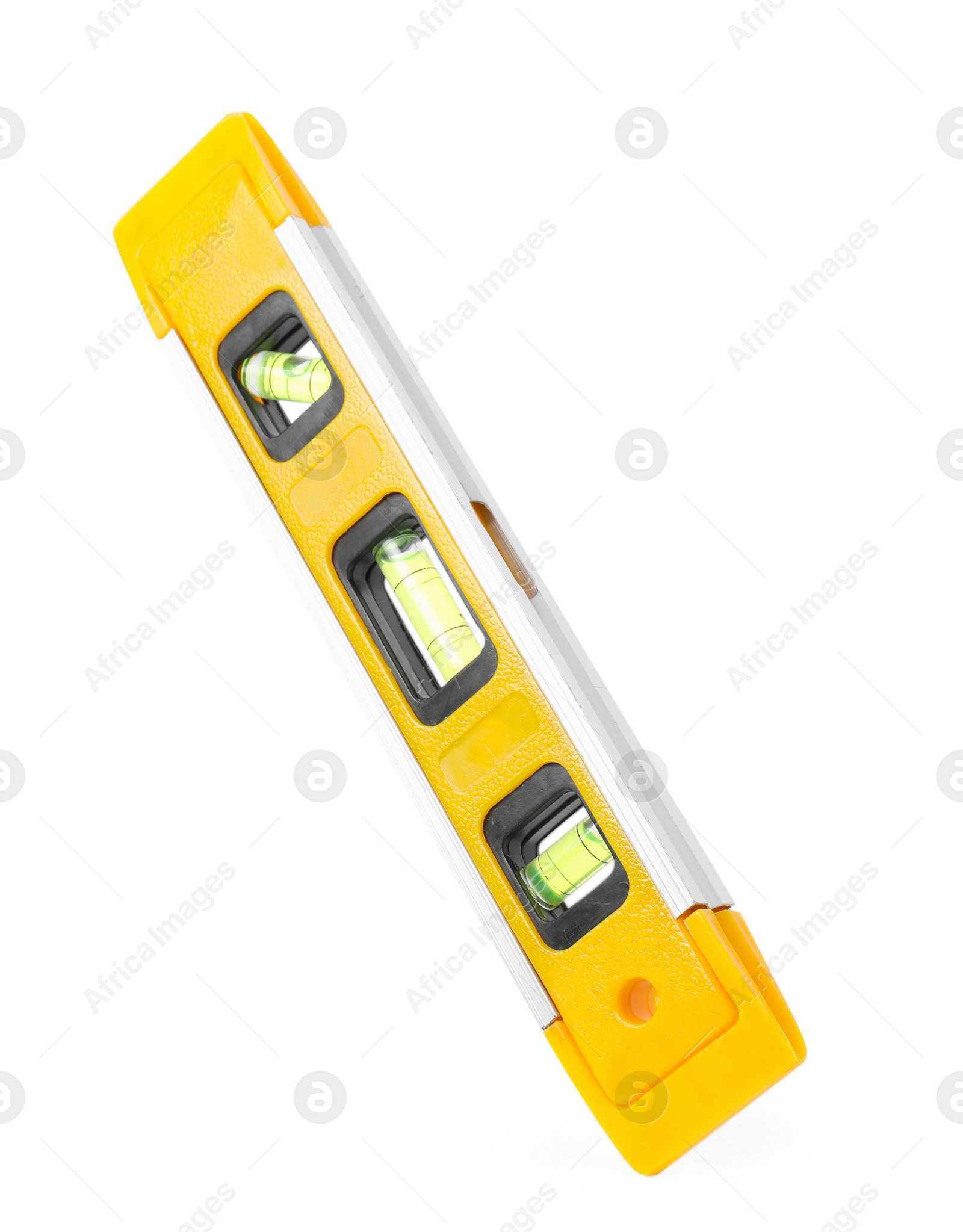 Photo of Yellow building level isolated on white. Construction tool