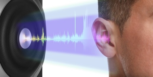 Modern audio speaker and man listening to music on white background, closeup view of ear. Banner design