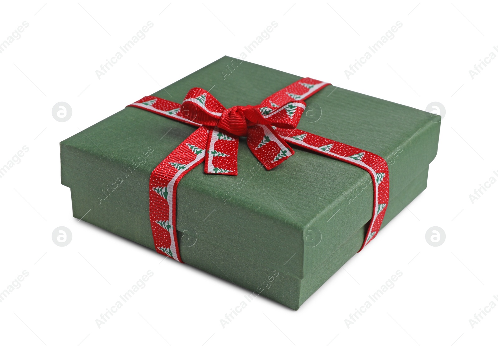 Photo of Christmas gift. Box decorated with patterned ribbon on white background