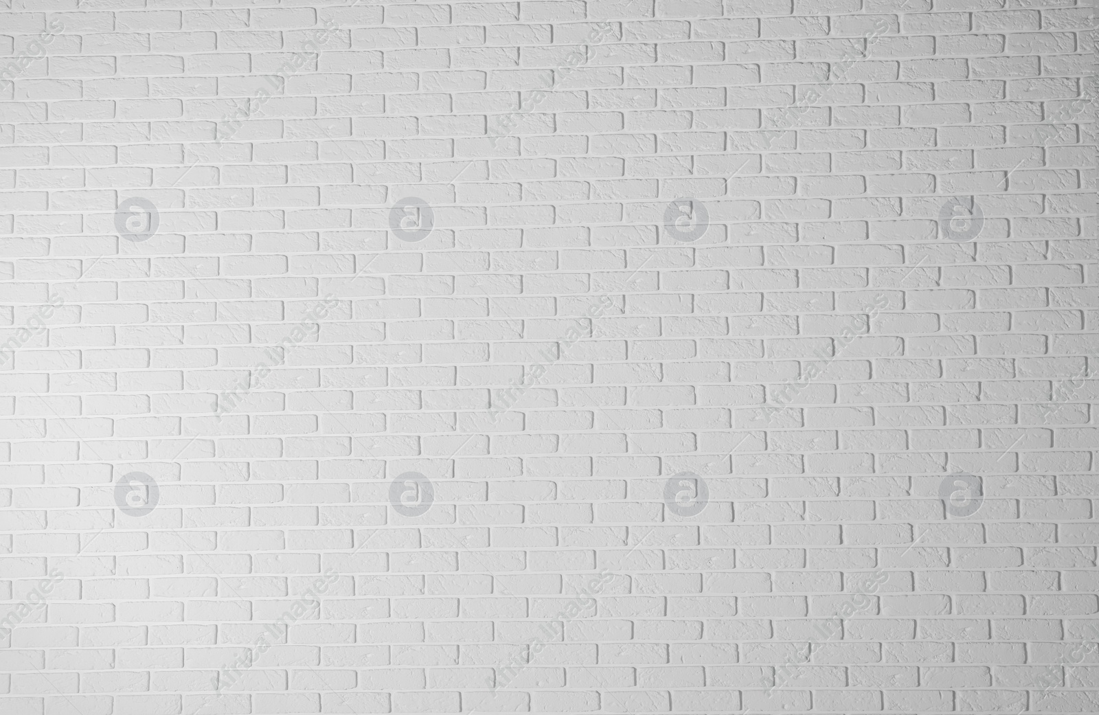 Photo of Texture of white brick wall as background