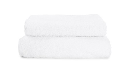 Photo of Two folded terry towels isolated on white