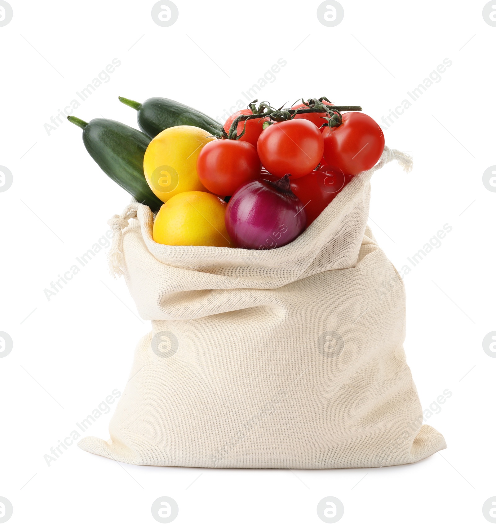 Photo of Cotton eco bag with vegetables isolated on white