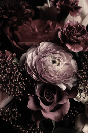 Beautiful bouquet of different flowers, closeup. Floral card design with dark vintage effect