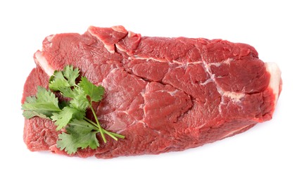 Photo of Piece of raw beef meat with parsley isolated on white, top view