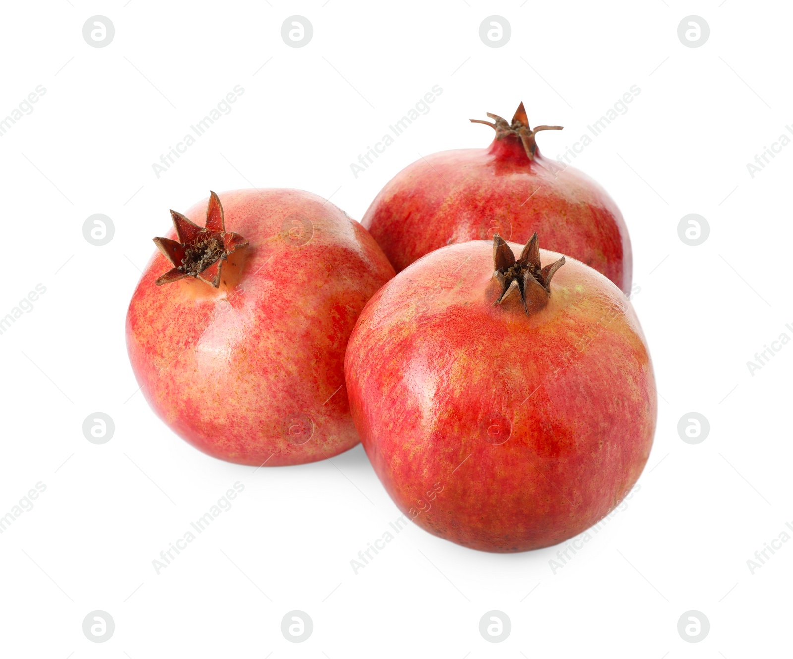 Photo of Many fresh ripe pomegranates isolated on white