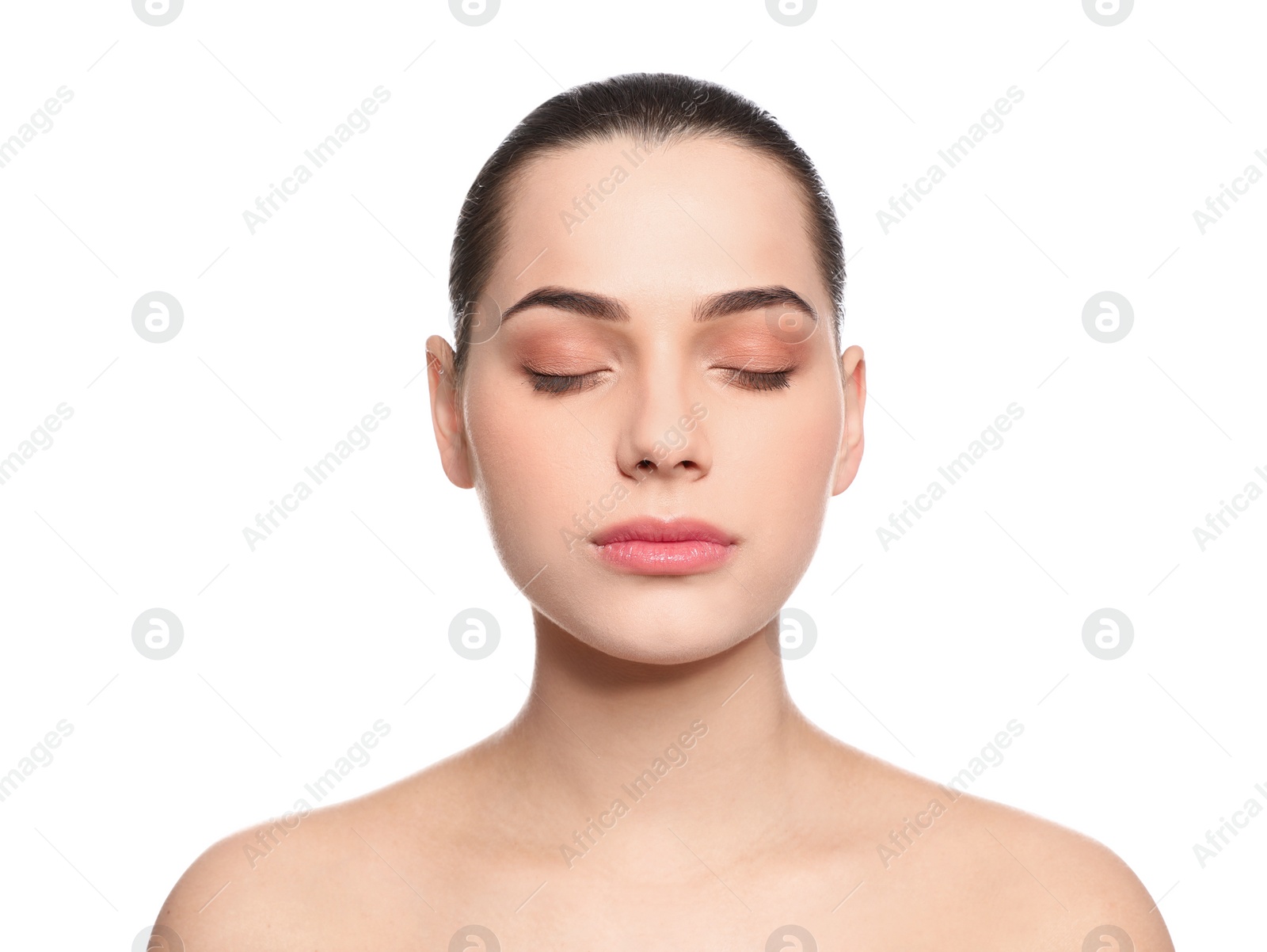 Photo of Portrait of young woman with beautiful face and natural makeup on white background