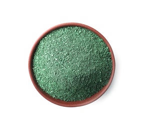 Photo of Bowl of spirulina algae powder isolated on white, top view
