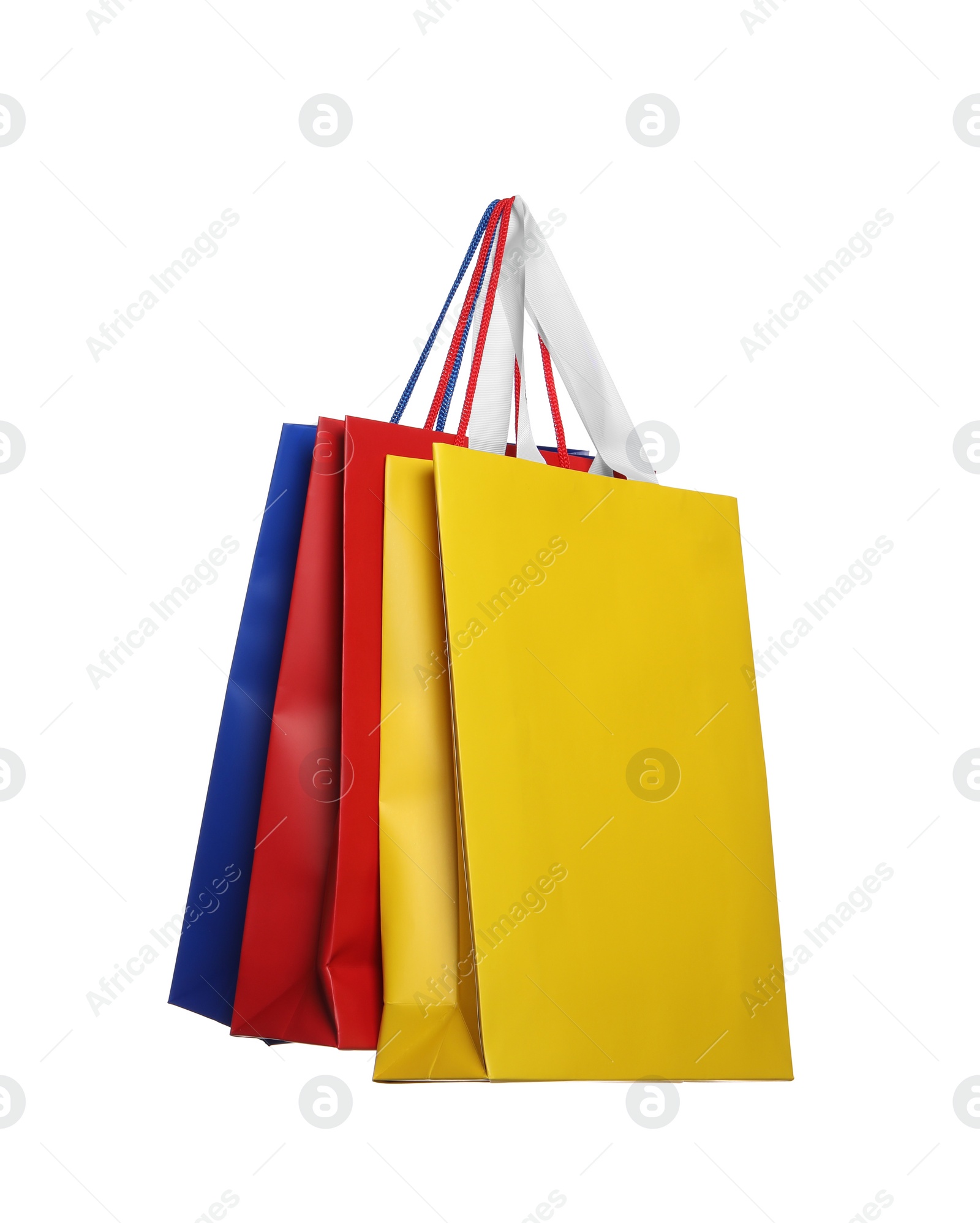 Photo of Colorful paper shopping bags isolated on white