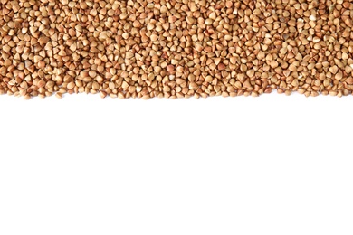 Uncooked buckwheat on white background, top view