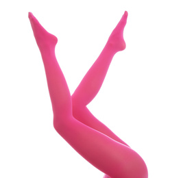 Photo of Woman wearing pink tights on white background, closeup of legs