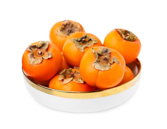 Bowl with whole delicious juicy persimmons isolated on white