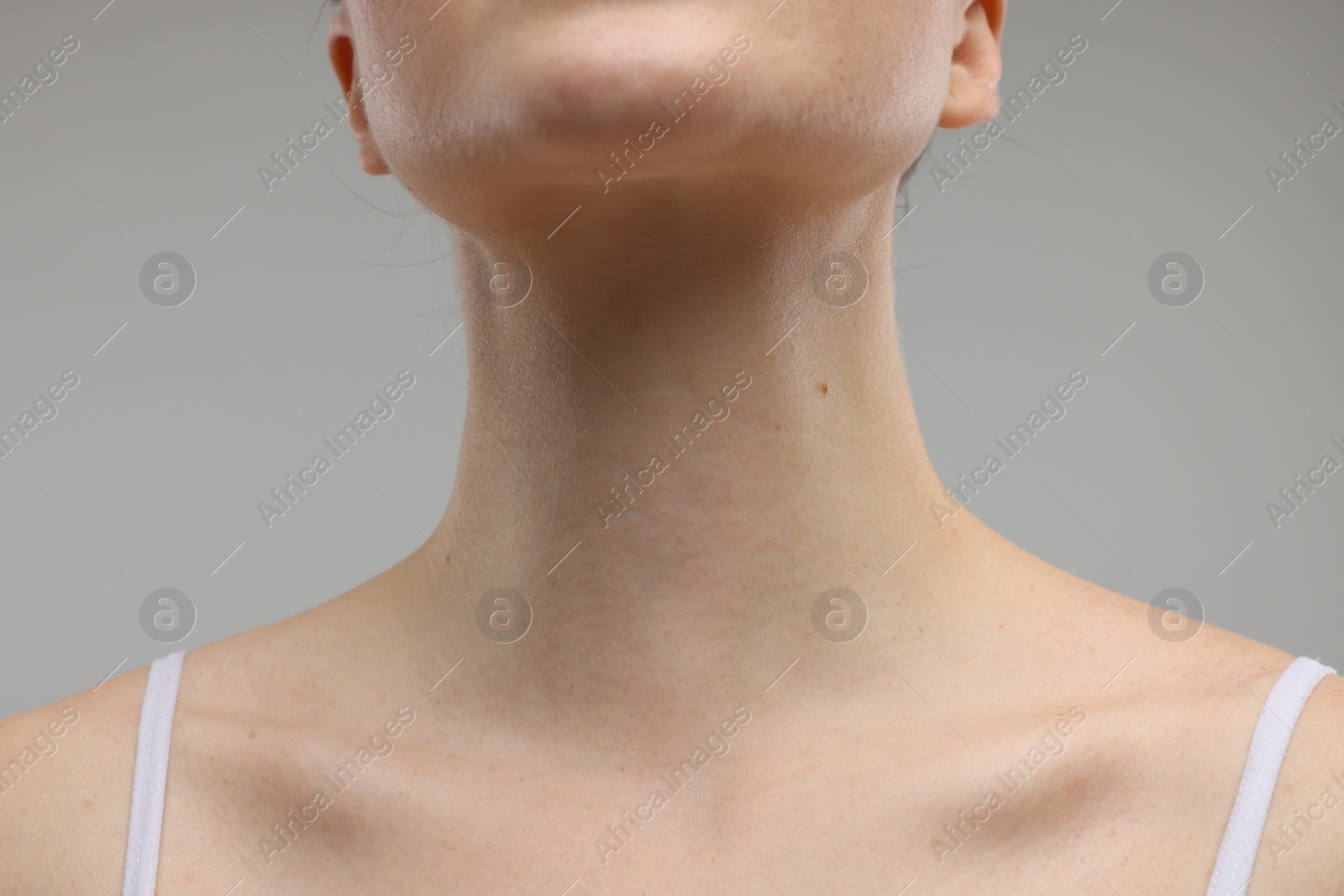 Photo of Beauty concept. Woman on grey background, closeup