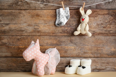 Composition with baby accessories on wooden background