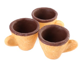 Edible espresso cookie cups isolated on white