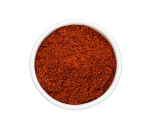 Bowl with aromatic paprika powder isolated on white, top view
