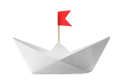 Handmade paper boat with red flag isolated on white. Origami art