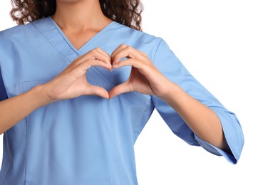 Photo of African-American doctor making heart with hands on white background, closeup