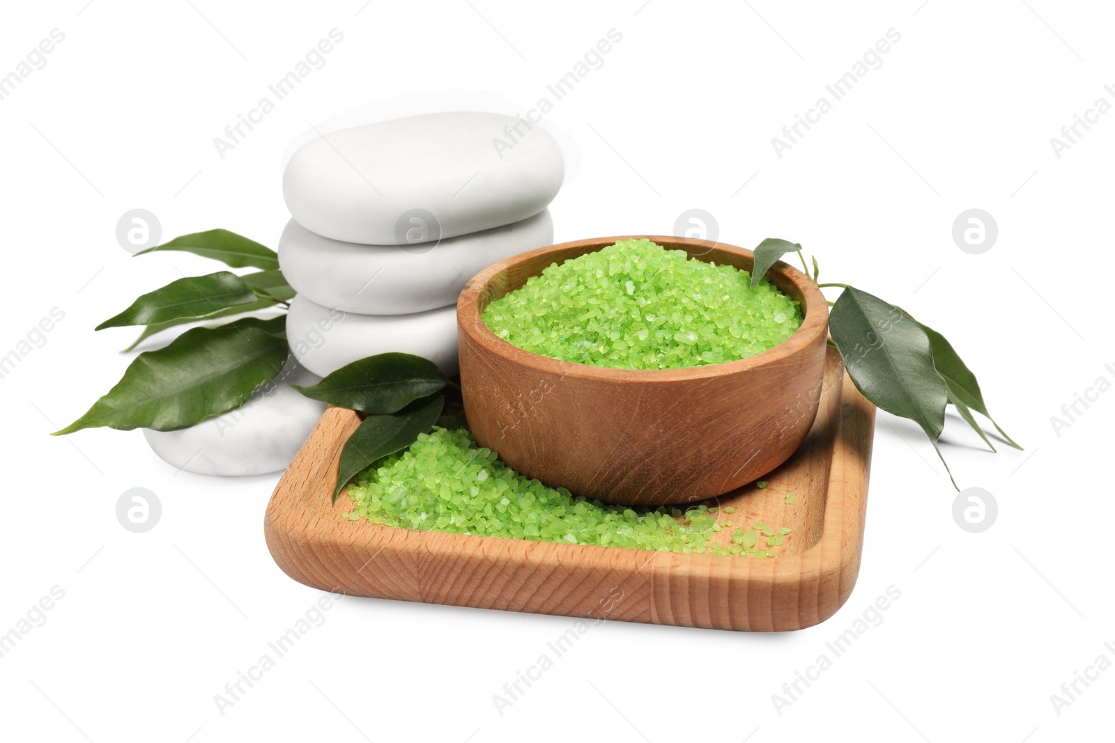 Photo of Green sea salt in bowl, spa stones and leaves isolated on white