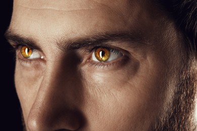 Image of Captivating gaze. Man with rare eye color, closeup