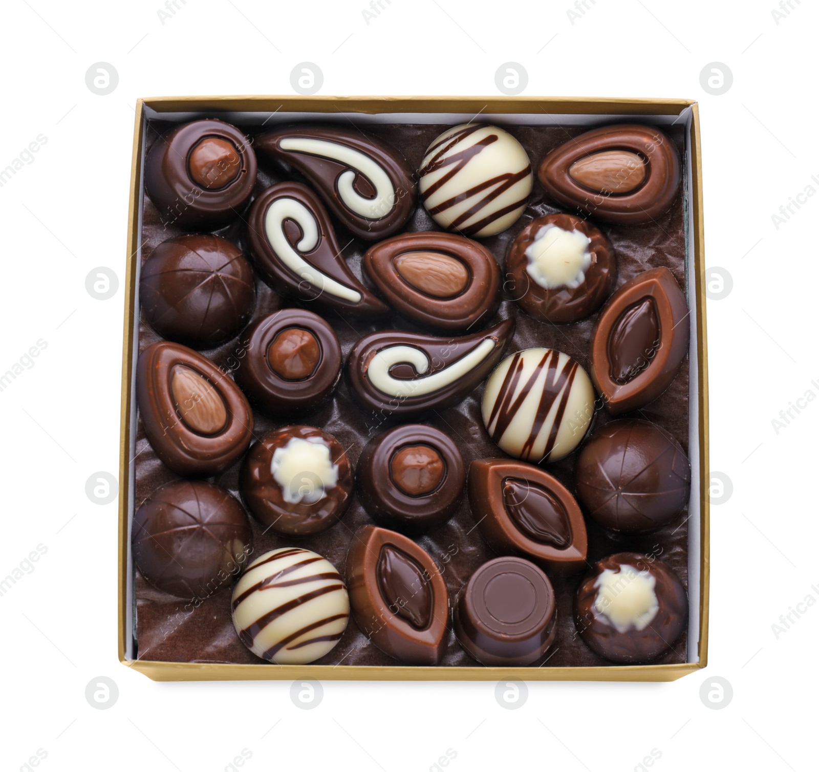 Photo of Box of delicious chocolate candies isolated on white, top view