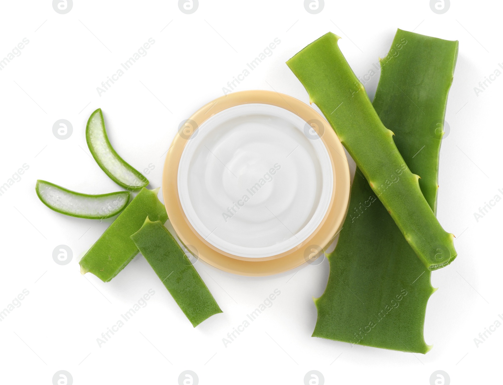 Photo of Jar of natural cream and cut aloe leaves isolated on white, top view