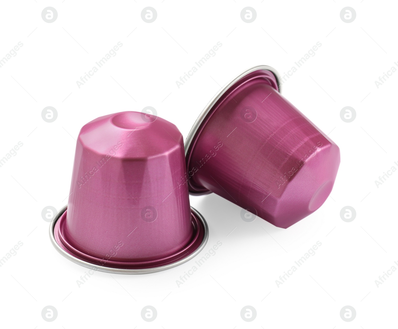 Photo of Two plastic coffee capsules isolated on white