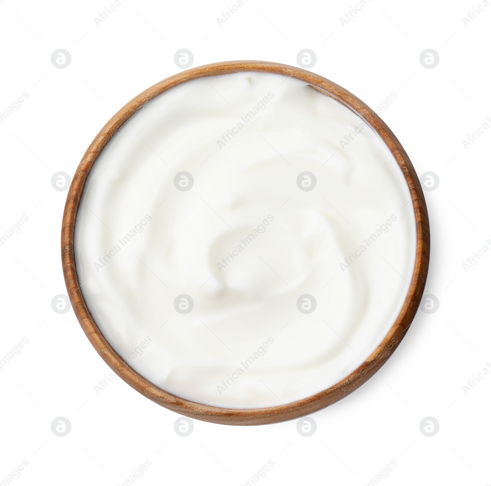 Photo of Delicious natural yogurt in bowl isolated on white, top view