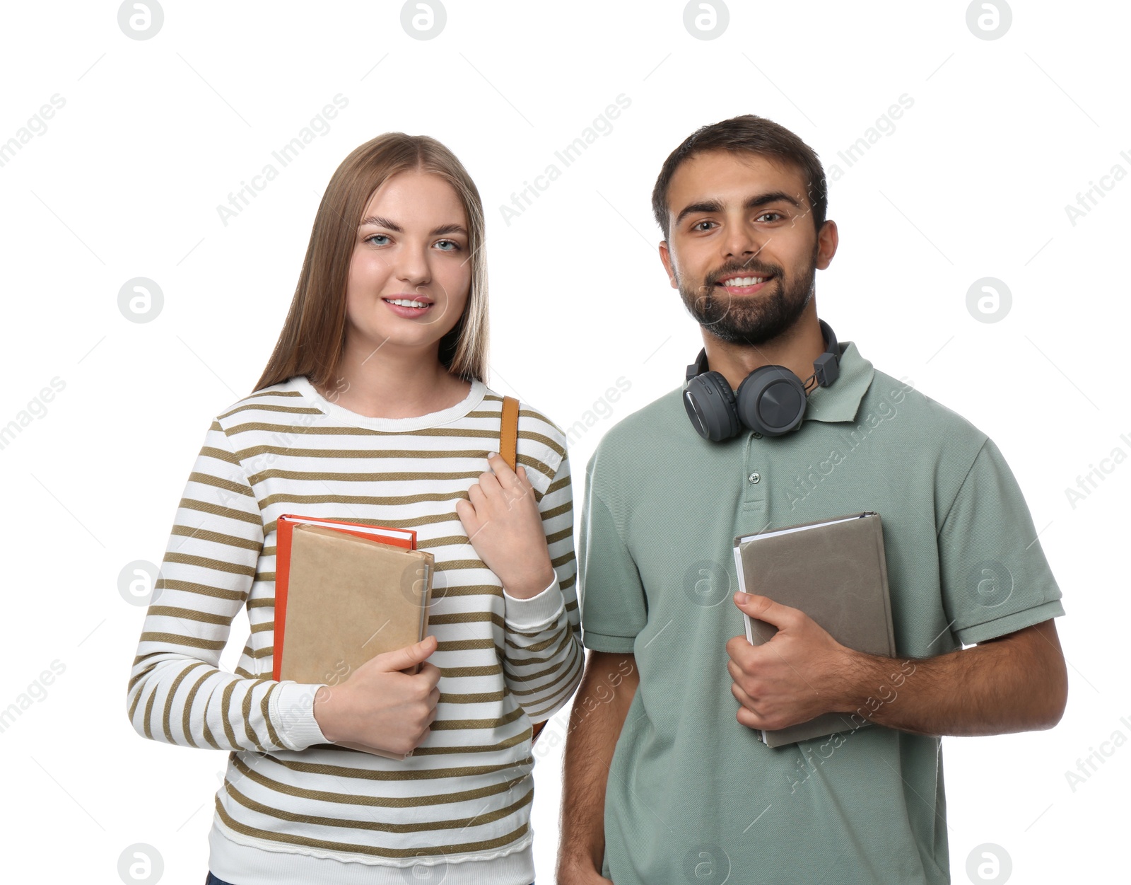 Photo of Happy students with books on white background