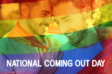 National Coming Out day. Happy gay couple with rainbow flag outdoors, closeup