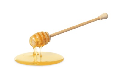 Natural honey dripping from dipper on white background