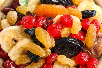 Photo of Different dried fruits as background, closeup. Healthy lifestyle