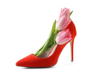 Photo of Stylish lady's shoe and beautiful spring tulips on white background. International Women's Day