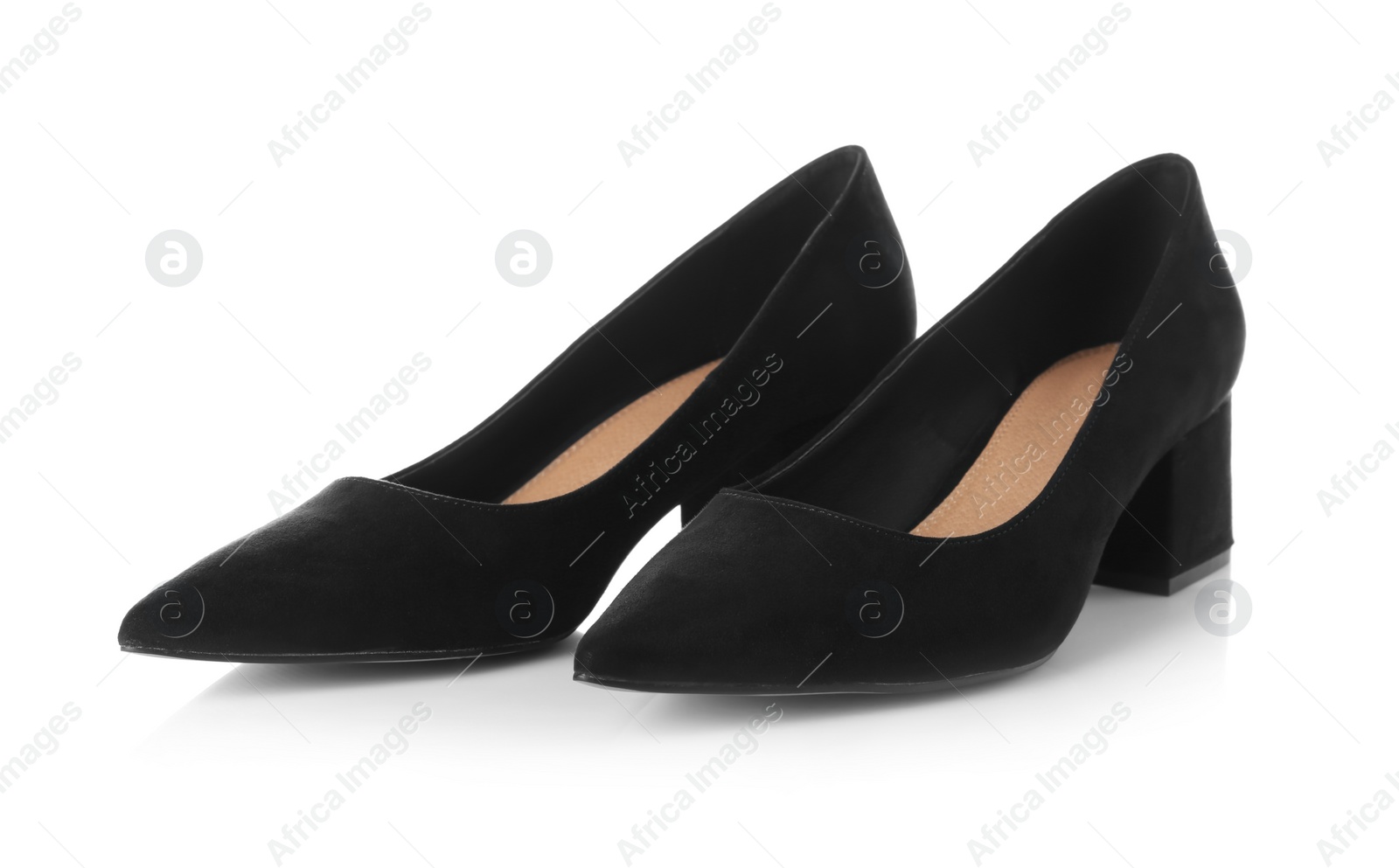 Photo of Pair of female shoes on white background