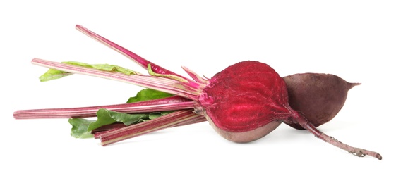 Halves of raw ripe beet isolated on white