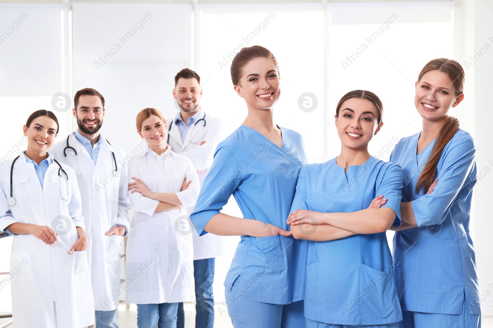 Photo of Group of medical doctors at clinic. Unity concept