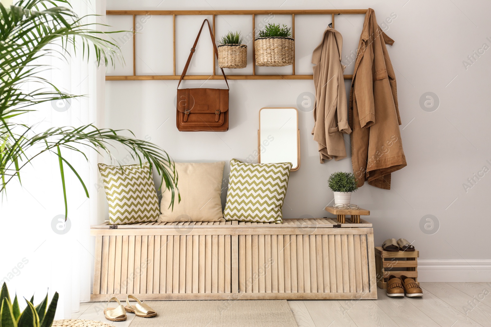 Photo of Cozy hallway interior with new stylish furniture